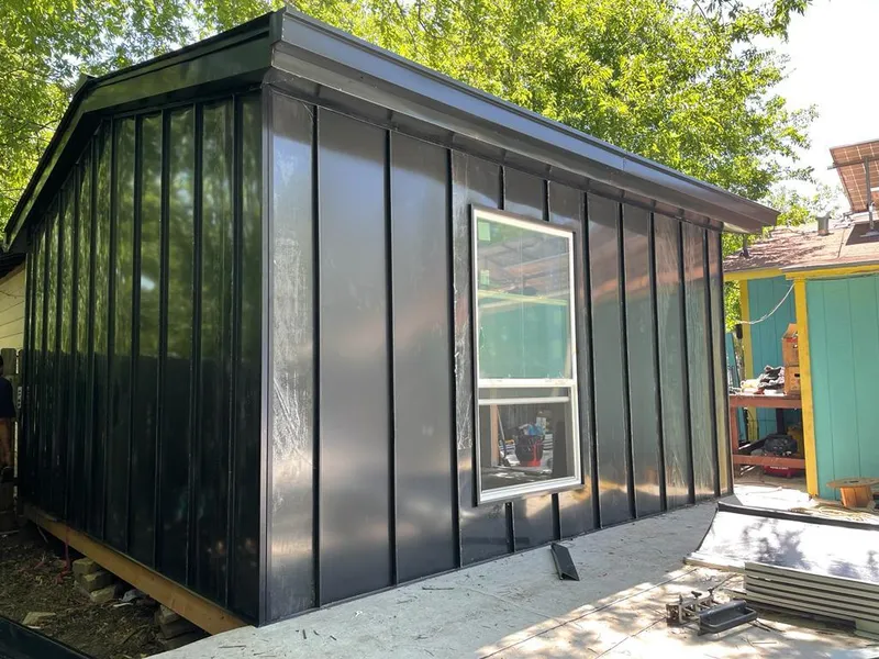 Black standing seam metal wall panels for Metal Roof Installation in Ceres