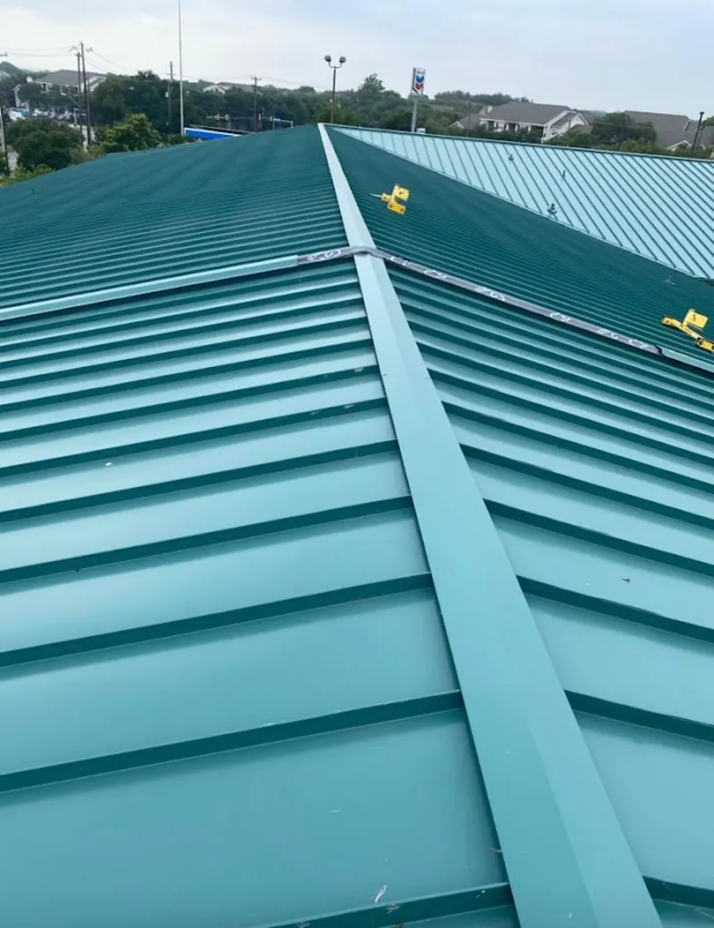 Green commercial metal roof ridge and valley for Metal Roof Repair in Ceres